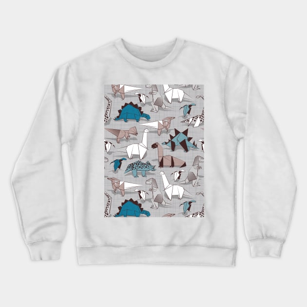 Origami dino friends // pattern // grey linen texture background blue white and beige dinosaurs Crewneck Sweatshirt by SelmaCardoso